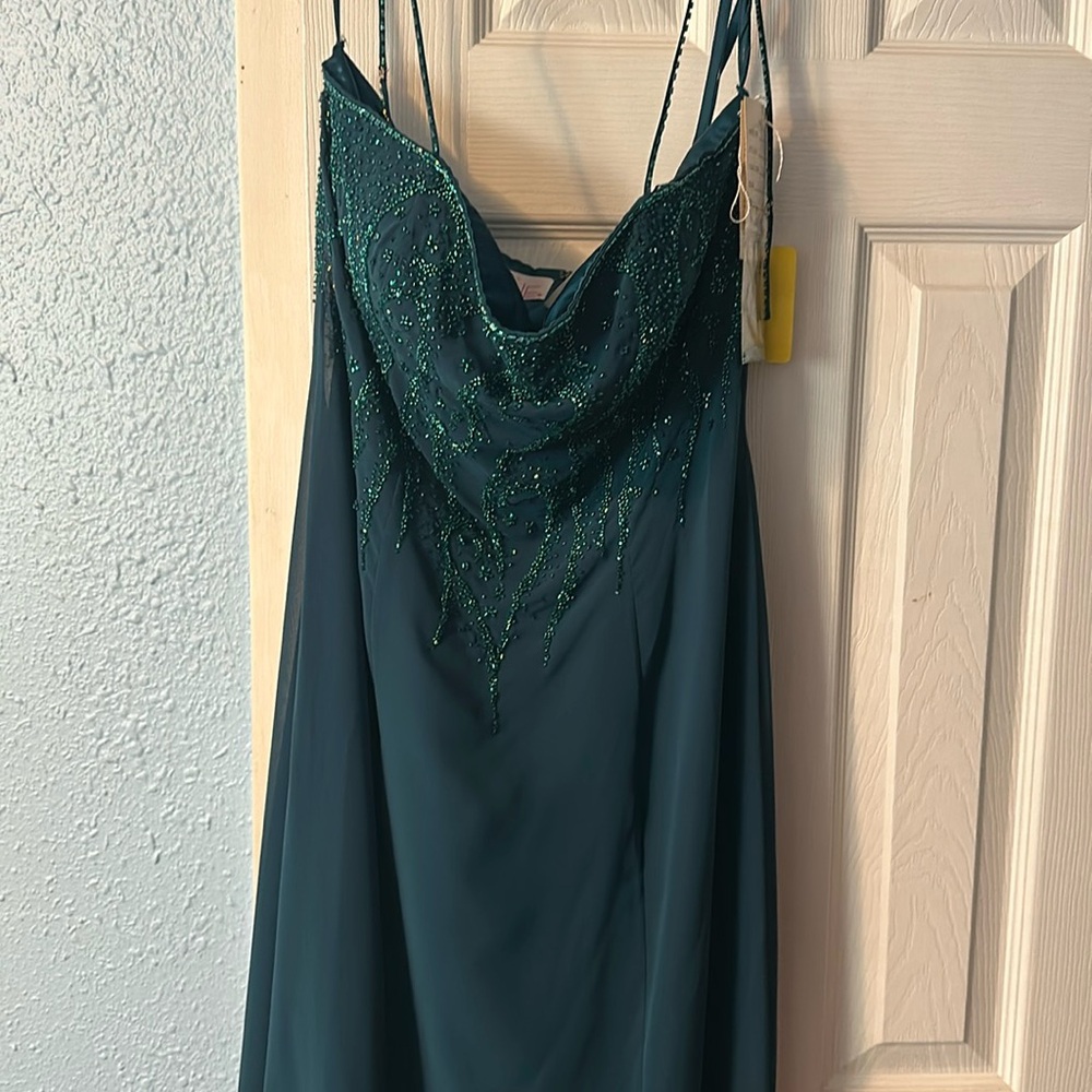 Size 11 prom dress, it’s Teal colored